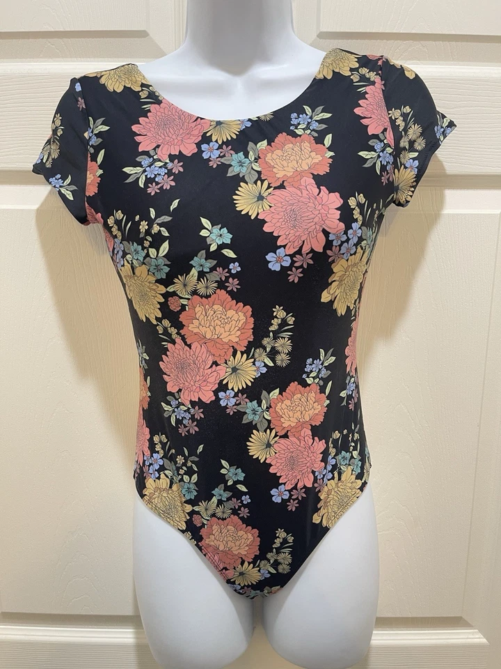 Traje de baño O’Neill de una pieza negro floral atado trasero talla 16 para niñas Foto 1 de 4