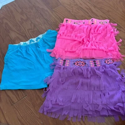 PAQUETE Lote de 3 Falda Pantalones Cortos Justice Rosa Azul Púrpura Niña Niños Mujeres Talla 6 Foto 1 de 4