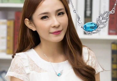 Collar colgante azul hoja pluma lateral cristales blancos plata para mujer AD Foto 1 de 4