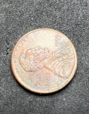 1999 Lincoln Penny Wide AM FS-901 + Strikethrough Red/Brown Light Rainbow Tone - Image 1 of 4