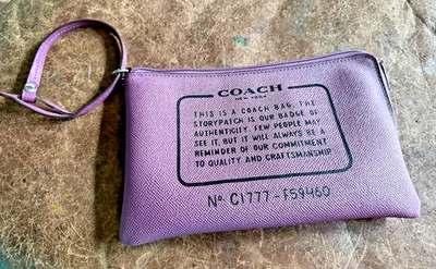 Precioso bolso de muñeca Coach F59460 Story púrpura con cremallera superior 9x5,5 Foto 1 de 4