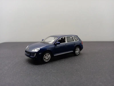 Minichamps 1:64 Porsche Cayenne blau Modellauto - Bild 1 von 4
