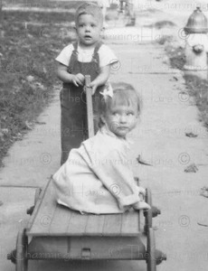 Vintage Photo 1940s Childhood Wagon Ride Boy Pulling Girl Sidewalk Snapshot - Picture 1 of 3