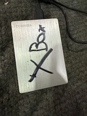 Toshiba Canvio Slim II 1TB Portable External Hard Drive, Silver DTD210 Used - Image 1 of 3