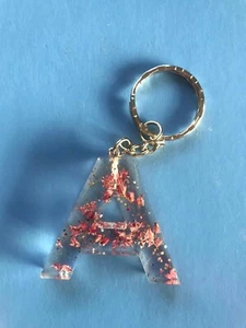 Keyrings - Handmade gift, made from resin, shells, dried flowers, glitter etc. - Picture 1 of 9