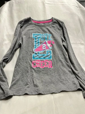 Lote 4344 - Camiseta para Niña DANSKIN Gris Love to Cheer - Talla 7/8 Foto 1 de 2