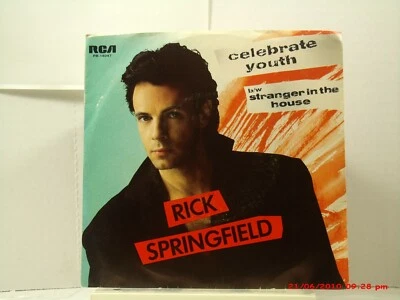 RICK SPRINGFIELD-a -(45 W/ PIC. SLEEVE)- CELEBRATE YOUTH / STRANGER IN THE HOUSE - Image 1 of 4