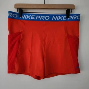 NUOVO Nike Pro Dri Fit arancione compressione allenamento pantaloncini tasche donna taglia XL - Foto 1 di 3