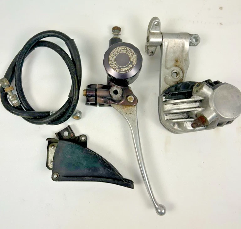 Honda CB750F 1979 CB750K piezas de freno delantero palanca, pinza, cilindro maestro, línea Foto 1 de 4