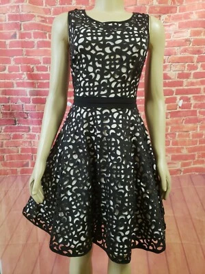 Vestido acampanado sin mangas XSCAPE talla 4 negro corte láser NUEVO Foto 1 de 4