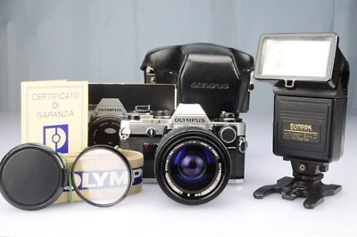 Olympus OM-10 Zuiko Zoom 35-70mmf:4+Manual Adapter+Sunpak 344-D+Borsa 1980s - Immagine 1 di 4