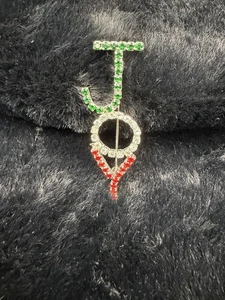 Broche prendedor de Navidad tono plata rojo verde punta transparente estrás JOY - Imagen 1 de 4