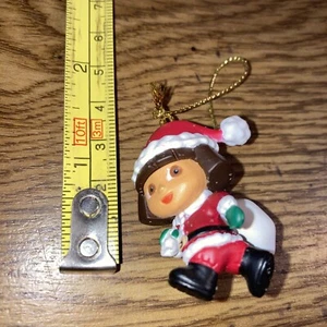 Christmas Ornament Dora the explorer in santa outfit with bag of presents - Bild 1 von 2