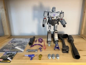 ¡Auténtico! Takara Tomy Transformers MP-36 Obra Maestra Megatron 100% Completo - Imagen 1 de 8