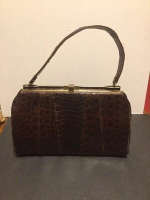 Cartera vintage de cuero y latón para mujer de 1920’s Foto 1 de 4