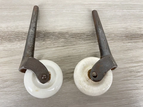 2- Vintage Casters 5 1/2" Porcelain And Cast Iron. 2" Wheel Diameter Cover