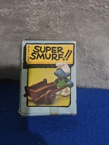 The Smurfs Gardener Super Smurf with Brown Wheelbarrow German BOXED - Picture 1 of 3