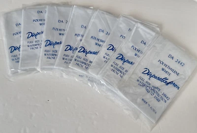 8 delantales desechables de polietileno blanco 24" x 42" Foto 1 de 4