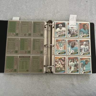 Juego completo de fútbol americano Topps 1984 en carpeta de hojas Marino Elway Dickerson novato Foto 1 de 4