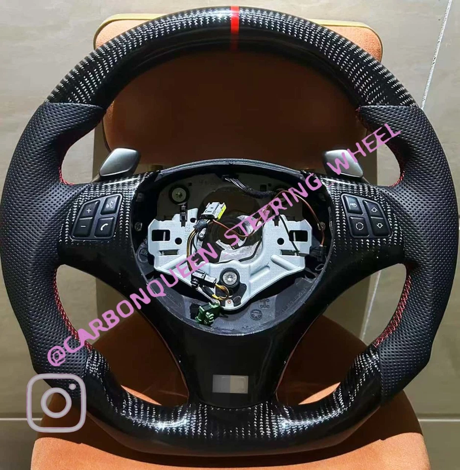 Volante FIBRA DE CARBONO REAL PARA BMW E90E92E82E87 RAYA ROJA CON CUERO NEGRO Foto 1 de 2