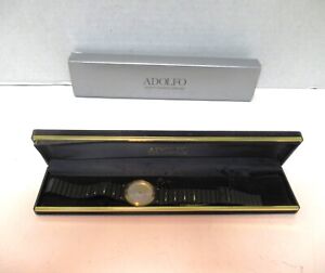 VINTAGE ADOLFO QUARTZ WATCH NEW IN CASE MOTHER OF PEARL FACE BLACK/GOLD BEAUTY !