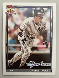 1991 Topps Don Mattingly #100 New York Yankees logotipo oscuro error 10 éxitos - Imagen 1 de 2