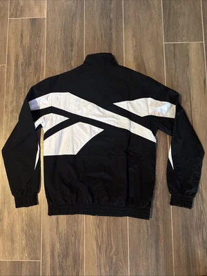 Chaqueta deportiva Reebok Classics Vector blanca y negra para hombre talla mediana nueva con etiquetas Foto 1 de 4