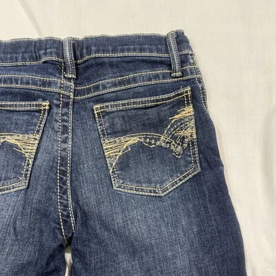 Pantalones de mezclilla Wrangler 20x azules para niños talla 12 corte boot regular lavado oscuro excelentes Foto 1 de 4