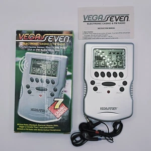 Vegas Seven Electronic Casino Handheld Game & FM Radio 7 Games NEW Open Box - Picture 1 of 1