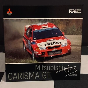 MITSUBISHI CHARISMA GT RALLIART FREDDY LOIX 1999 WRC WERKSEITIG SPEZIFIKATIONSKARTE BROSCHÜRE - Bild 1 von 2