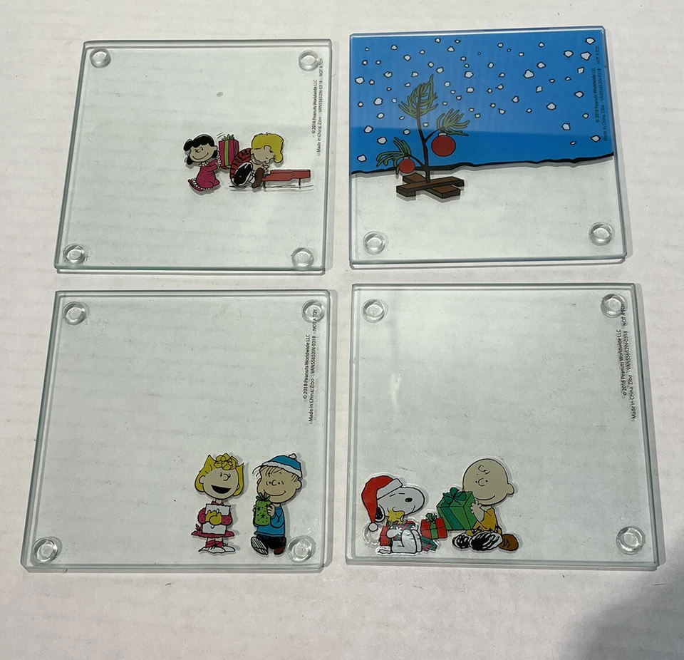 Peanuts 4 Piece Holiday Glass Coaster Set Charlie Brown Snoopy 4"x4" - Image 1 of 4