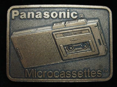 QG05153 *NOS* VINTAGE AÑOS 70 **MICROCASSETTES PANASONIC** HEBILLA DE CINTURÓN DE MÚSICA Foto 1 de 2