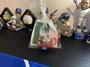 BOSTON RED SOX BAG INCLUDING JUMBO RED SOX STICKER, FENWAY DIRT, WRISTBAND, ETC. - Picture 1 of 2