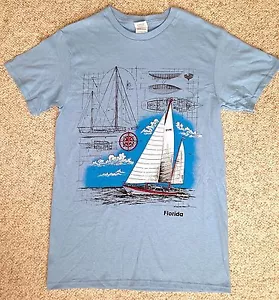 T-SHIRT BARCA A VELA "FLORIDA" blu chiaro barca blueprints bussola nautica ADULTO SM - Foto 1 di 3
