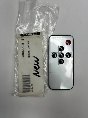 Sharper Image GX1233 LCD TV/Monitor Remote Control, Silver - OEM NOS - Image 1 of 2