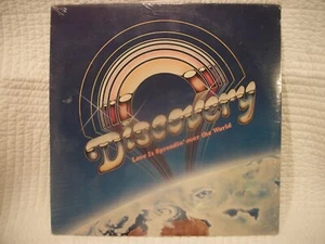 SEALED DISCOVERY LOVE IS SPREADING ALL OVER THE WORLD VINYL LP RECORD 1979 - Imagen 1 de 2