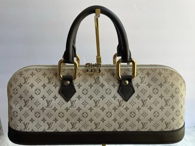 Bolso Louis Vuitton Mini Lin con asa superior Foto 1 de 4
