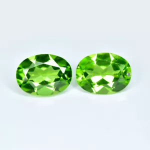 2.56Ct (2Pcs) Oval_Shimmering Quality Unheated Pakistan Peridot Gems - Picture 1 of 1