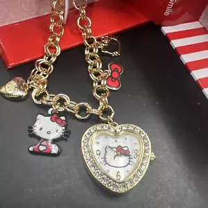 Orologio da polso Sanrio Accutime Hello Kitty a forma di herat con più charms da appendere - Foto 1 di 12