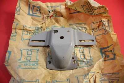 NOS HONDA C200 Honda CA200 Honda 90 Touring NOS Tail lamp Bracket 84701-030-810B - Image 1 of 4