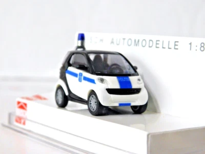 Busch 48909  1/87 Smart City Coupe Belgian Police  NIB - Image 1 of 3