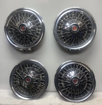 "Juego 1977-1979 Ford Mercury Comet, Cougar, Granada, LTD, tapacubos de radios de cable 14""" Foto 1 de 4