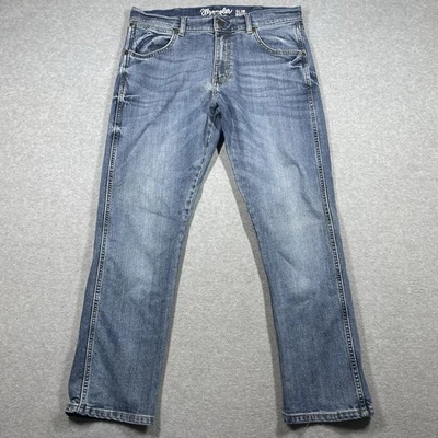 Wrangler Retro Slim Boot Jeans Hombre 34x30 (se adapta a 34x29) Azul Medio Lavado Sólido Foto 1 de 4