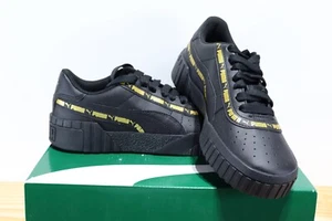 Puma Cali Taping Jr Sneakers Black And Gold Sizes 4C, 4.5C, 5C, 5.5C - Picture 1 of 7
