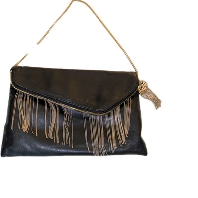 Bolso sin asas Henri Bendel New York de cuero negro con flecos en buen estado usado Foto 1 de 4