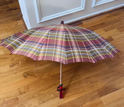 VINTAGE MULTI COLOR PLAID UMBRELLA W/ RED LUCITE HANDLE & WOOD SHAFT - Image 1 of 4