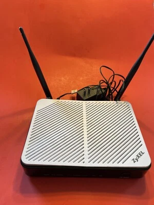 Módem de 4 puertos Centurylink Zyxel FR1000Z con router inalámbrico + fuente de alimentación Foto 1 de 4