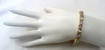 ДИЗАЙНЕРСКИЙ БРАСЛЕТ ИЗ СЕРЕБРА 925 ПРОБЫ С ГОЛУБЫМ ТОПАЗОМ И ДРАГОЦЕННЫМИ КАМНЯМИ HAN - Изображение 1 из 4