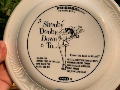 (FEEDMORE DONATION) 1978 Shooby Dooby Dog Disc Golf  Frisbee Waitress Girl #789 - Image 1 of 4