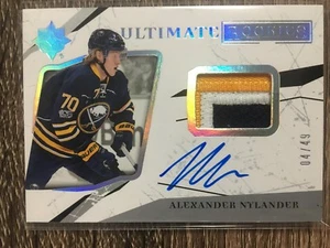 Alexander Nylander 2017-18 Ultimate Coll. Ultimate Rookies Patch 3 CLR #04/49 - Picture 1 of 1